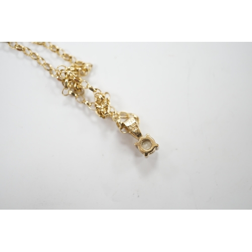 1995 - A modern 9ct gold and solitaire diamond set pendant, 9mm, on a 9ct chain, 38cm, gross weight 2.2 gra... 