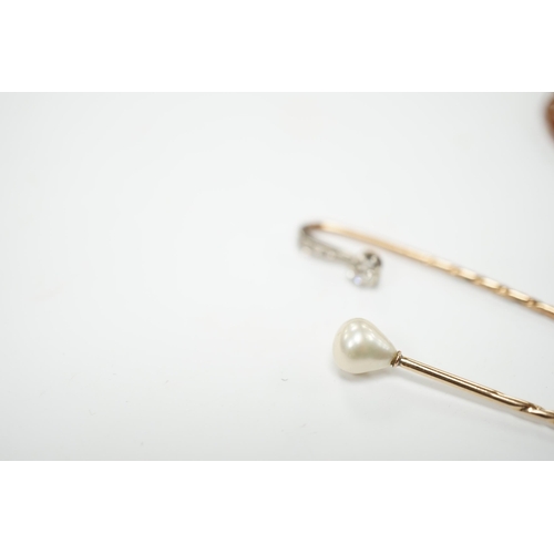 2004 - A yellow metal and diamond cluster set stick pin, 69mm, a yellow metal and cultured pearl set stick ... 