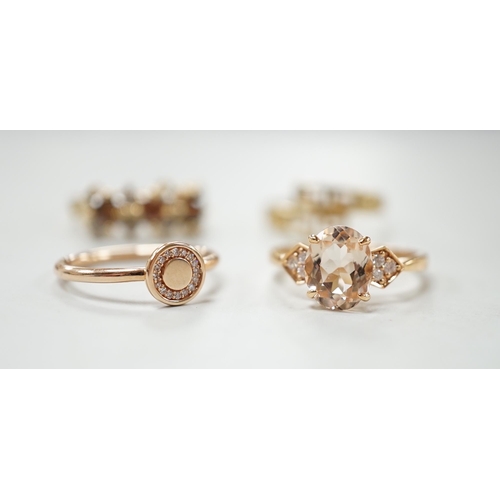 2005 - Three assorted modern 585 yellow metal and gem set rings, including two rose coloured and a 585 'Gre... 