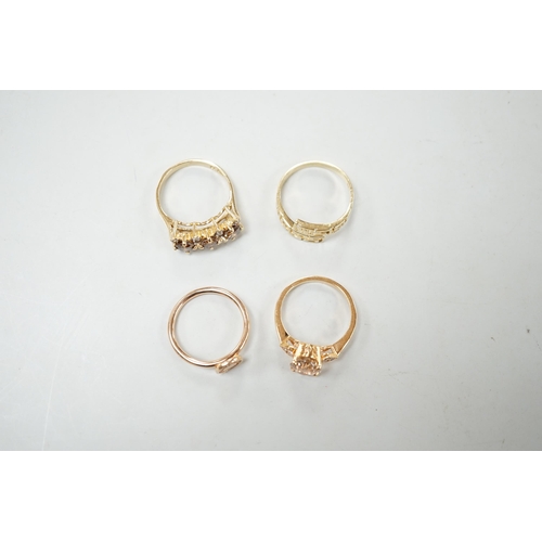 2005 - Three assorted modern 585 yellow metal and gem set rings, including two rose coloured and a 585 'Gre... 