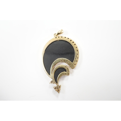 2023 - A Hong Kong 585 yellow metal, black onyx and diamond set stylised pendant, 43mm, gross weight 12.1 g... 