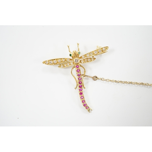 2030 - A modern 18ct gold, ruby, emerald and diamond cluster set dragonfly brooch, 40mm, gross weight 4.8 g... 