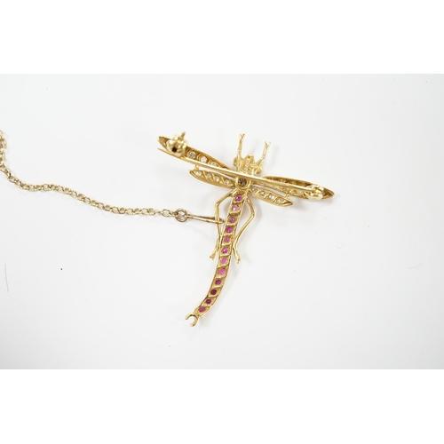 2030 - A modern 18ct gold, ruby, emerald and diamond cluster set dragonfly brooch, 40mm, gross weight 4.8 g... 