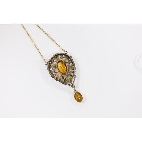 2073 - A yellow metal, white metal and two stone citrine set drop pendant necklace, with citrine set clasp,... 