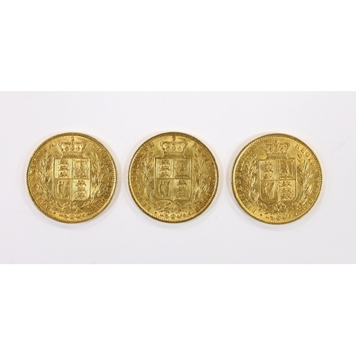 2101 - British gold coins, three Victoria gold sovereigns - 1869 die no. 28, about fine, two 1862 wide date... 