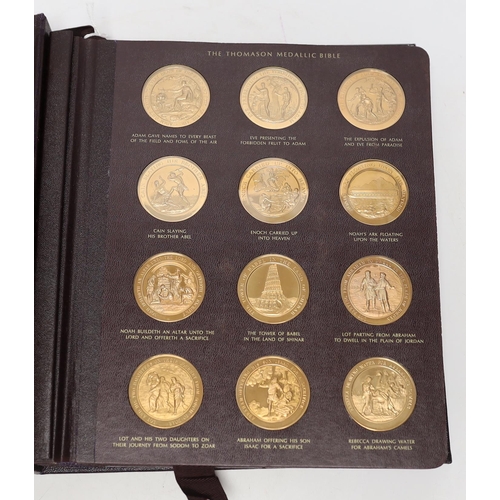 2166 - The Thomason Medallic Bible, Franklin mint version, sixty medals in a folder