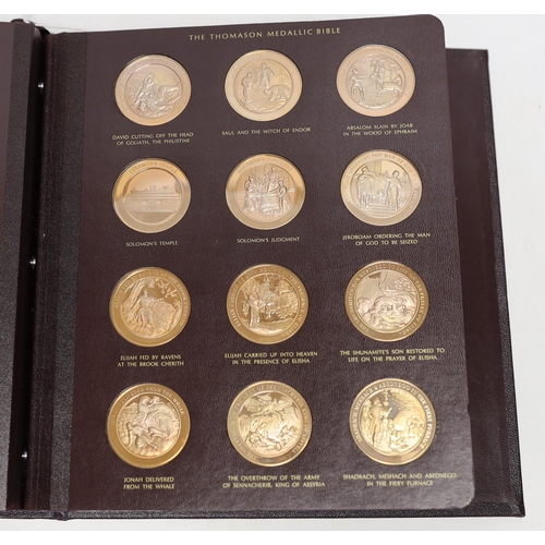 2166 - The Thomason Medallic Bible, Franklin mint version, sixty medals in a folder