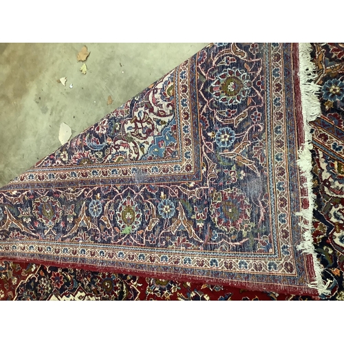 106 - A North West Persian red ground carpet, 300 x 200cm