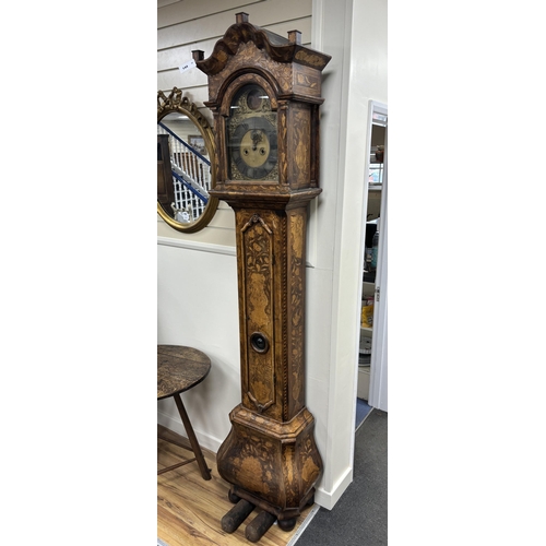 144 - A 19th century Dutch floral marquetry walnut eight day longcase clock, the arched dial marked John W... 