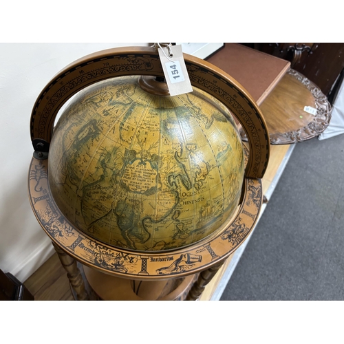 154 - A reproduction globe drinks trolley, height 92cm