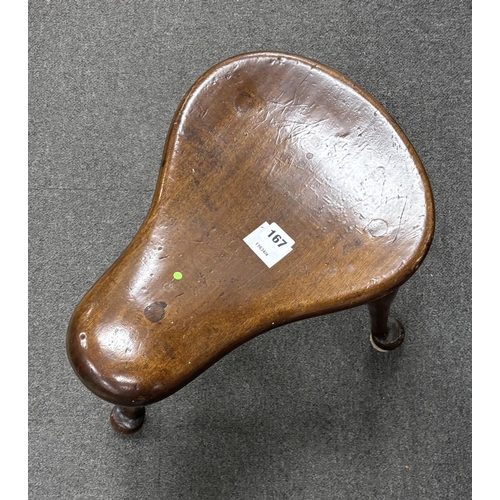 167 - * * A George III style mahogany saddle seat three legged stool, width 41cm, depth 41cm, height 42cm ... 