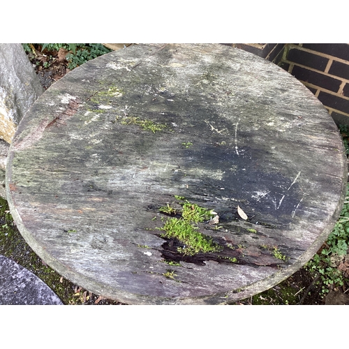 187 - A near pair of Victorian cast iron Britannia pub tables, one with weathered stone top, the other woo... 