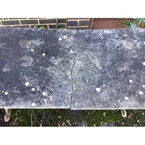 189 - A Victorian painted cast iron garden table with weathered marble top, together with a similar table ... 