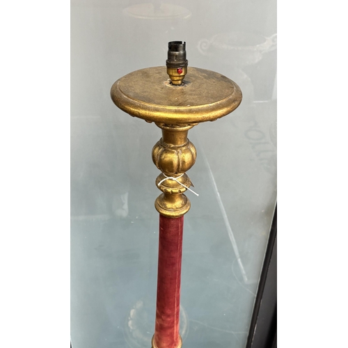 192 - A gilt standard lamp with part fabric covered column