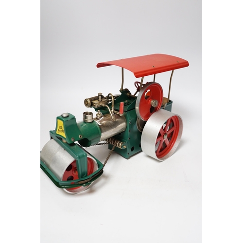 253 - A Wilesco live steam tinplate and aluminium model Road Roller, missing its chimney