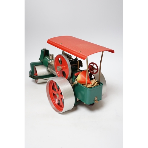 253 - A Wilesco live steam tinplate and aluminium model Road Roller, missing its chimney