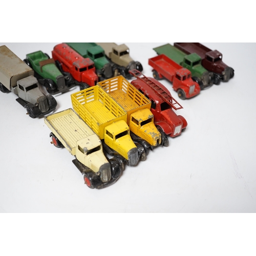 254 - Twenty-five Dinky Toys and Atlas Dinky including a few pre-war examples; Delivery lorries, Market Ga... 