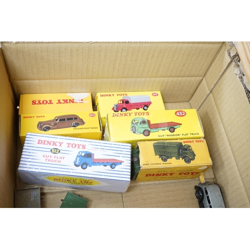 254 - Twenty-five Dinky Toys and Atlas Dinky including a few pre-war examples; Delivery lorries, Market Ga... 