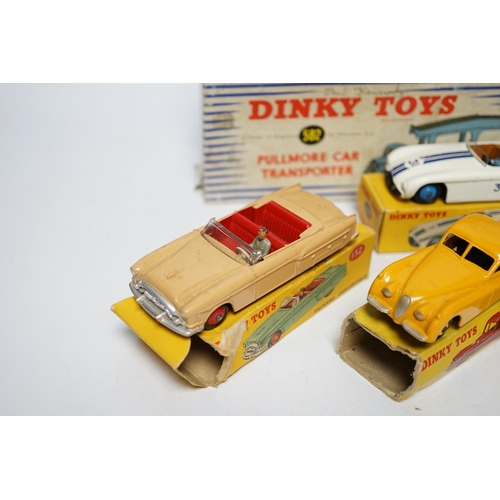 261 - Five boxed Dinky Toys; (132) a Packard Convertible, (131) a Cadillac Tourer, (133) a Cunningham C-5R... 