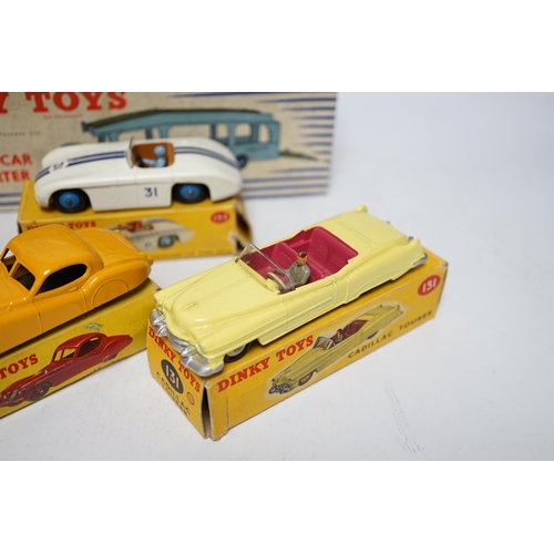 261 - Five boxed Dinky Toys; (132) a Packard Convertible, (131) a Cadillac Tourer, (133) a Cunningham C-5R... 