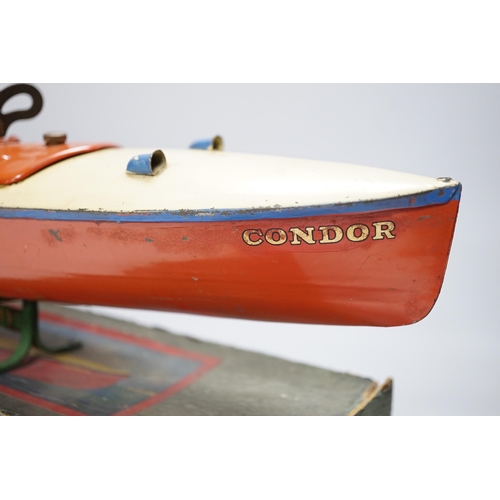 265 - A boxed, Hornby No.3 Condor clockwork speed boat, with original stand, length of hull 41.5cm