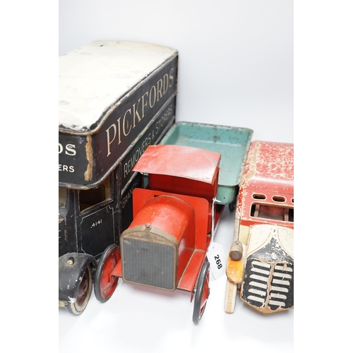 268 - Three model vehicles including; a tinplate Tri-ang tipper lorry, a Pickfords removal van (believed t... 