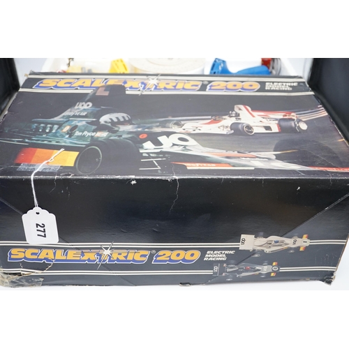 277 - A Scalextric 200 set, comprising of two cars, controllers, track sections, etc.