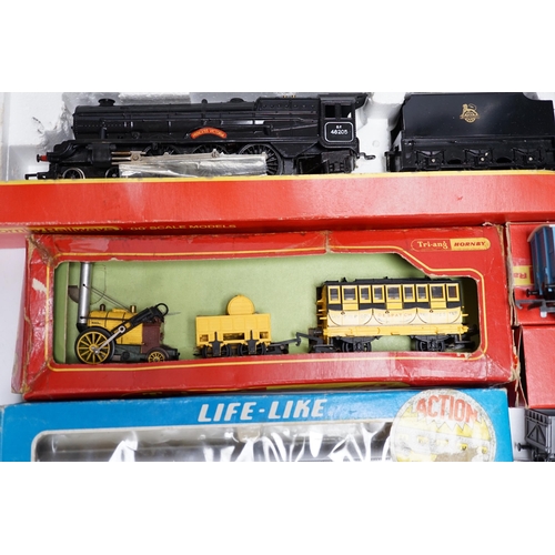 278 - Eight items of 00 and HO gauge model, railway, including; a Tri-ang Stevensons Rocket set (R346), a... 