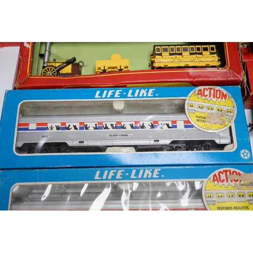 278 - Eight items of 00 and HO gauge model, railway, including; a Tri-ang Stevensons Rocket set (R346), a... 