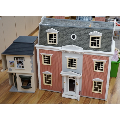 361 - A modern Georgian style dolls house, with two front opening doors, containing six rooms with furnish... 