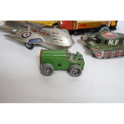 362 - A collection of tinplate toys including cars, a fire engine, a Firebird jet plane, a Tri-ang lifeboa... 