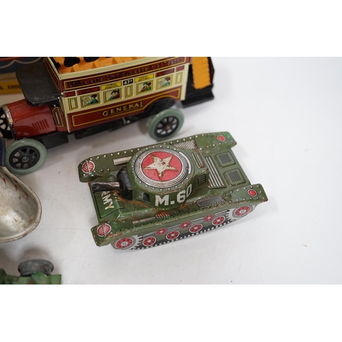 362 - A collection of tinplate toys including cars, a fire engine, a Firebird jet plane, a Tri-ang lifeboa... 