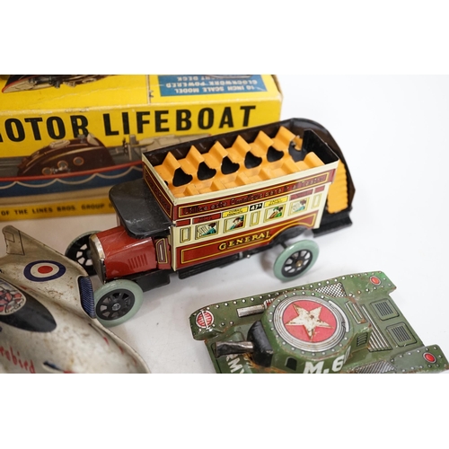 362 - A collection of tinplate toys including cars, a fire engine, a Firebird jet plane, a Tri-ang lifeboa... 