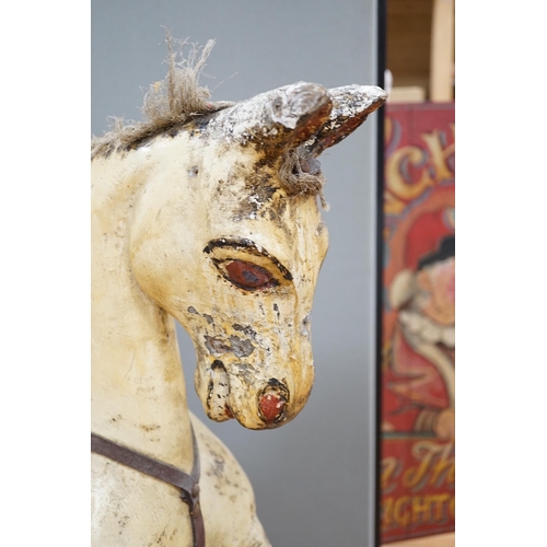 364 - A Rocking horse on a wooden pedestal rocker, with plaster, composite body, height, 97cm, length 152c... 