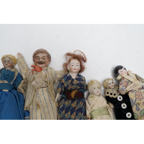 365 - Six doll's house dolls, two c.1860 and a male figure with moustache, two other bisque later figures ... 