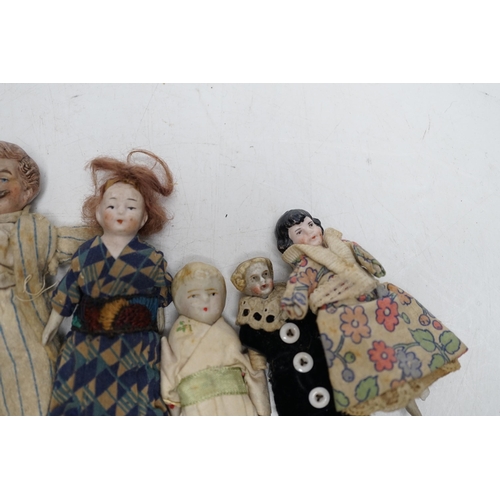 365 - Six doll's house dolls, two c.1860 and a male figure with moustache, two other bisque later figures ... 