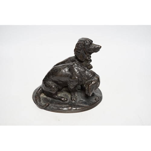 391 - After Emmanuel Fremiet (1824-1910), a bronze group of spaniels, 14cm