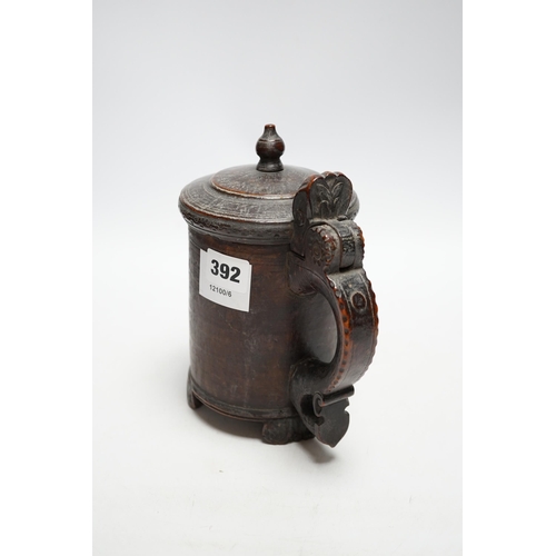 392 - A late 18th/early 19th century Scandinavian treen tankard, 20cm