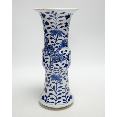 393 - A late 19th century Chinese blue and white dragon vase, 26cm