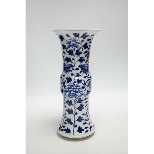 393 - A late 19th century Chinese blue and white dragon vase, 26cm