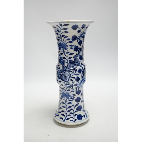 393 - A late 19th century Chinese blue and white dragon vase, 26cm