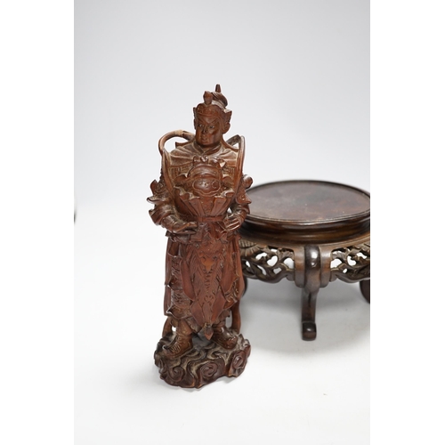 394 - Chinese wood figure of a warrior, two wood stands and a bronze zun vessel