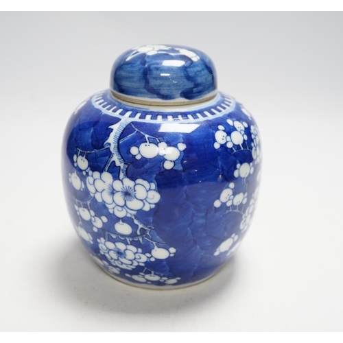 399 - A Chinese blue and white prunus jar and cover, 14cm