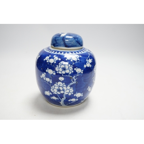 399 - A Chinese blue and white prunus jar and cover, 14cm