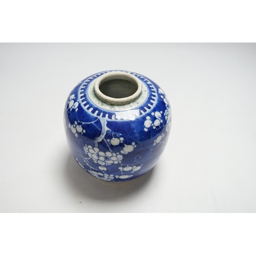 399 - A Chinese blue and white prunus jar and cover, 14cm