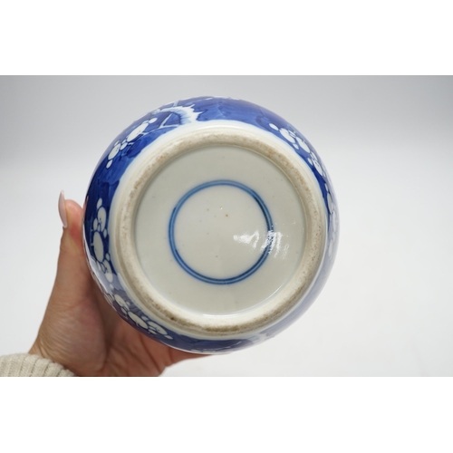 399 - A Chinese blue and white prunus jar and cover, 14cm