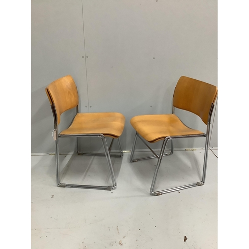 40 - Four mid century 'Howe' bent ply and chrome stacking chairs