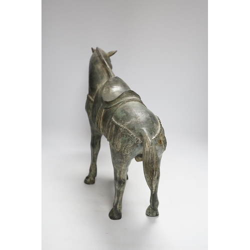 402 - A Chinese bronze horse, 35cm