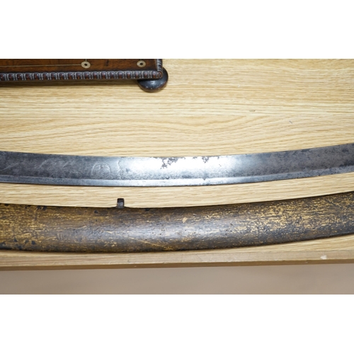 405 - An 18th century English cavalry sword with eastern related engraving to blade