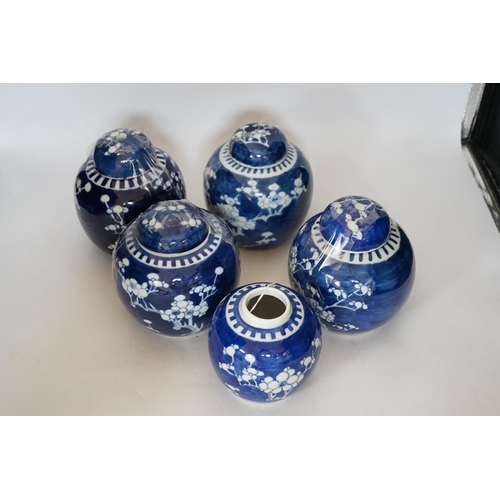 411 - Five Chinese blue and white prunus jars and covers